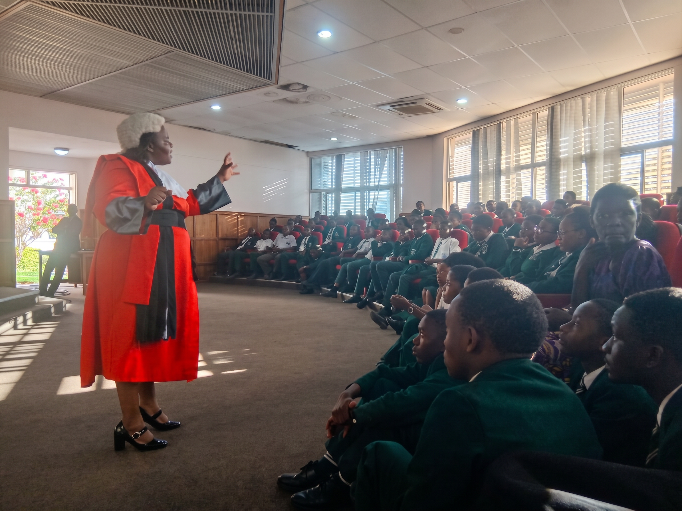 Honourable Justice Jean Kayira giving a career talk