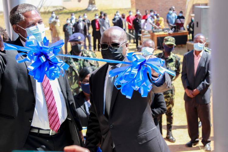 Hon. the Chief Justice and The  Minister of Justice cutting the ribbon to open Chitipa Court