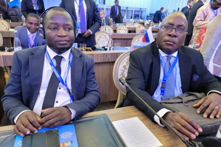 Justice of Appeal F. Kapanda, SC and Supreme Court Principal                    Court Administrator, Mr. K. Isaac following the conference proceedings. 