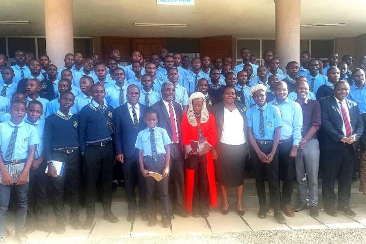 The Students pose with some of the Judges and Staff