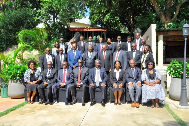 Participants led by the Honourable the Chief Justice Pose for a Group Photo