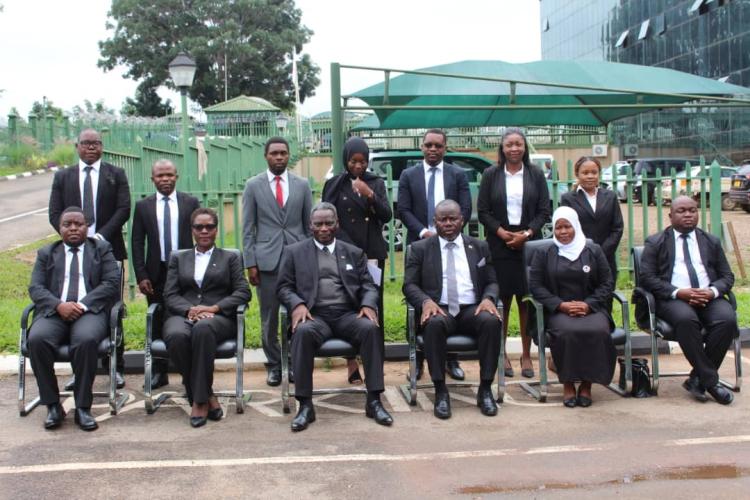 Newly sworn in Magistrates pose for a photo with the Honourable the Chief Justice, the Registrar, Deputy Senior  Registrar and the Chief Resident Magistrate