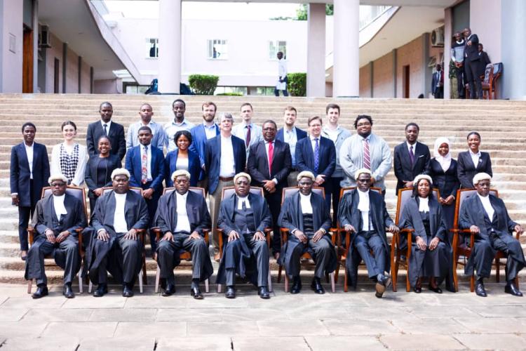 The Students and Staff Members Pose for a Photo with the Chief Justice and Justices of Appeal