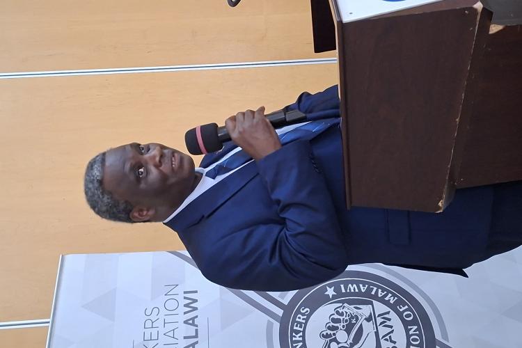 The Honourable the Chief Justice, Rizine Robert Mzikamanda, SC
